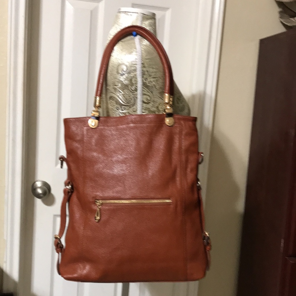 Erica Anenberg convertible leather bag with double straps. EUC